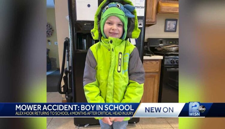 Boy injured in lawn mower accident returns to school