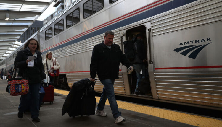 In this file photo, passengers prepare to board Amtrak’s California Zephyr at the Denver Union rail station during its 2,438-mile trip to Emeryville/San Francisco from Chicago that takes roughly 52 hours in Denver. (Joe Raedle/Getty Images)