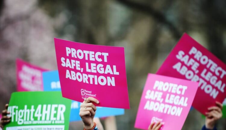 People attend a "Fight4Her" pro-choice rally in front of the White House at Lafayette Square on March 29, 2019 in Washington, DC. A coalition of NARAL Pro-Choice America, Planned Parenthood and Population Connection Action Fund gathered to demand the end of the 'Global Gag Rule'. (Photo by Astrid Riecken/Getty Images)