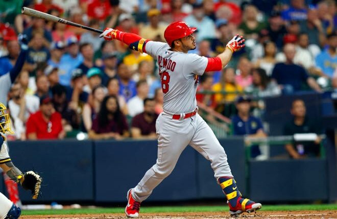 Cardinals third baseman Nolan Arenado hits a two-run home run during the sixth inning against the Brewers at American Family Field.
