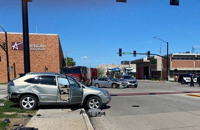 A wrecked Lexus straddles a sidewalk after it and two other cars collided May 15 at University Avenue and North Webster Avenue in Green Bay.