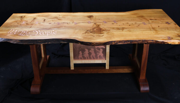 The tabletop is inlaid with words from the Preamble to the U.S. Constitution. (Courtesy of Jason Byers)