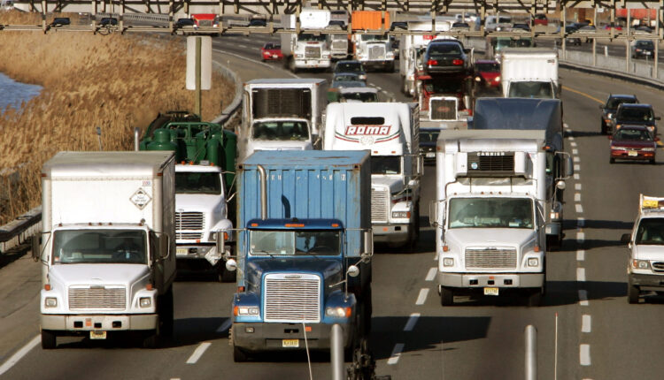 trucks-on-highway-scaled.jpg
