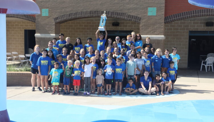 Dolphins Swim To State Championship - The Madison Record