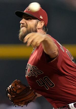 Aug 10, 2022;  Phoenix, Ariz.,USA;  Arizona Diamondbacks Madison Bumgarner pitches against the Pittsburgh Pirates at Chase Field.  Mandatory Credit: Joe Rondone-Arizona Republic