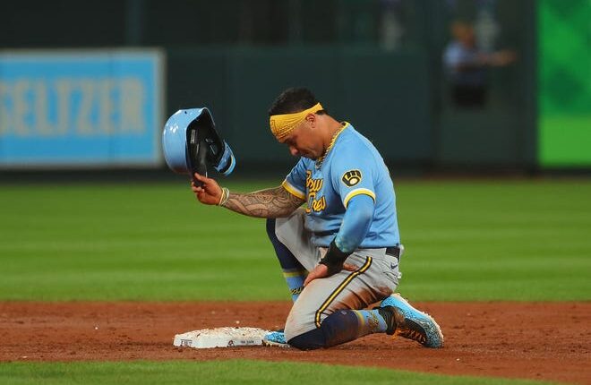 Kolten Wong of the Brewers reacts after being thrown out trying to steal second base against the Cardinals to end the third inning Wednesday night.