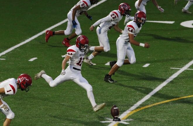 Fort Madison High School's Xander Wellman (11) kicks the ball to start Burlington High School's homecoming game, Friday Sept. 25, 2020 at Burlington's Bracewell Stadium. 