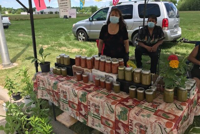 Vender Yolanda Santana of Green Bay sells homemade salsa at the Oneida Farmers' Market.