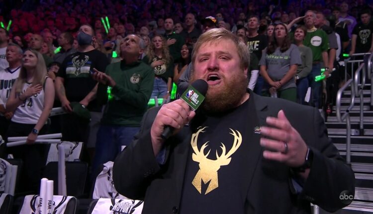 Bucks national anthem singer brings good luck charm to Racine Case basketball game
