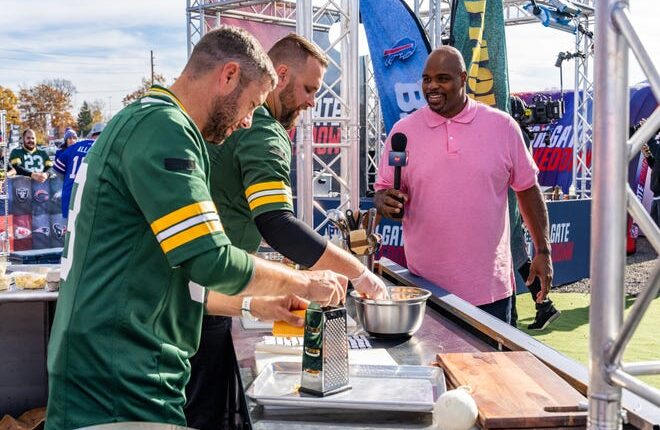 Chris Schemm of Lawrence, right, and Tyler Foti, represent the Green Bay Packers in an episode of 