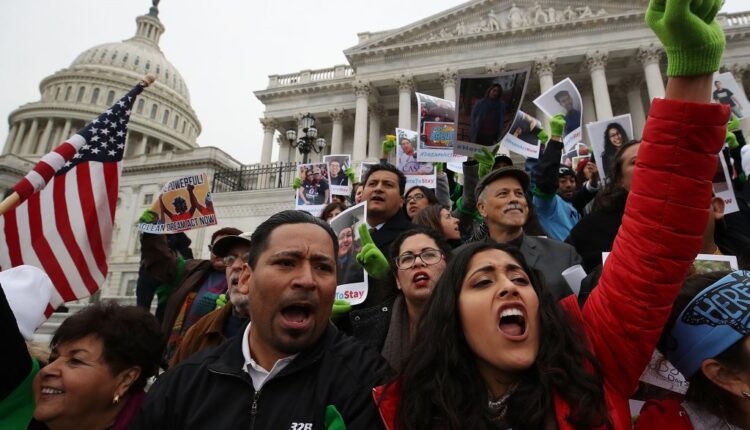 Protesters in front of the Senate side of the US Capitol urged Congress to pass the Deferred Action for Childhood Arrivals (DACA) program, in December 2017 in Washington, DC. Mark Wilson/Getty Images
