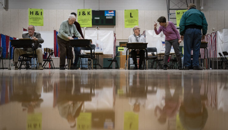 Voters cast ballots in New Hampshire