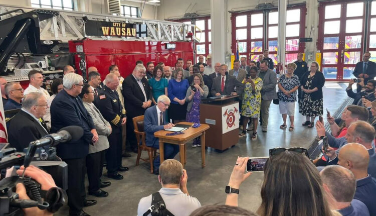 Evers signs shared revenue and school choice voucher funding legislation