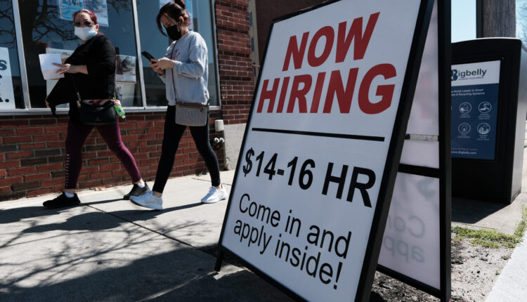 Economy adds more jobs in June even as hiring slows