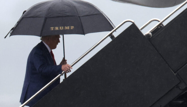Former President Donald Trump boards his plane at Reagan National Airport in Arlington, Virginia, following an arraignment in Washington, D.C. federal court on August 3, 2023. Trump pleaded not guilty to four felony criminal charges during his arraignment this afternoon after being indicted for his alleged efforts to overturn the 2020 election. (Win McNamee/Getty Images)