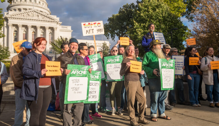 State employees rally for raises outside the Capitol on October 10, 2023 
